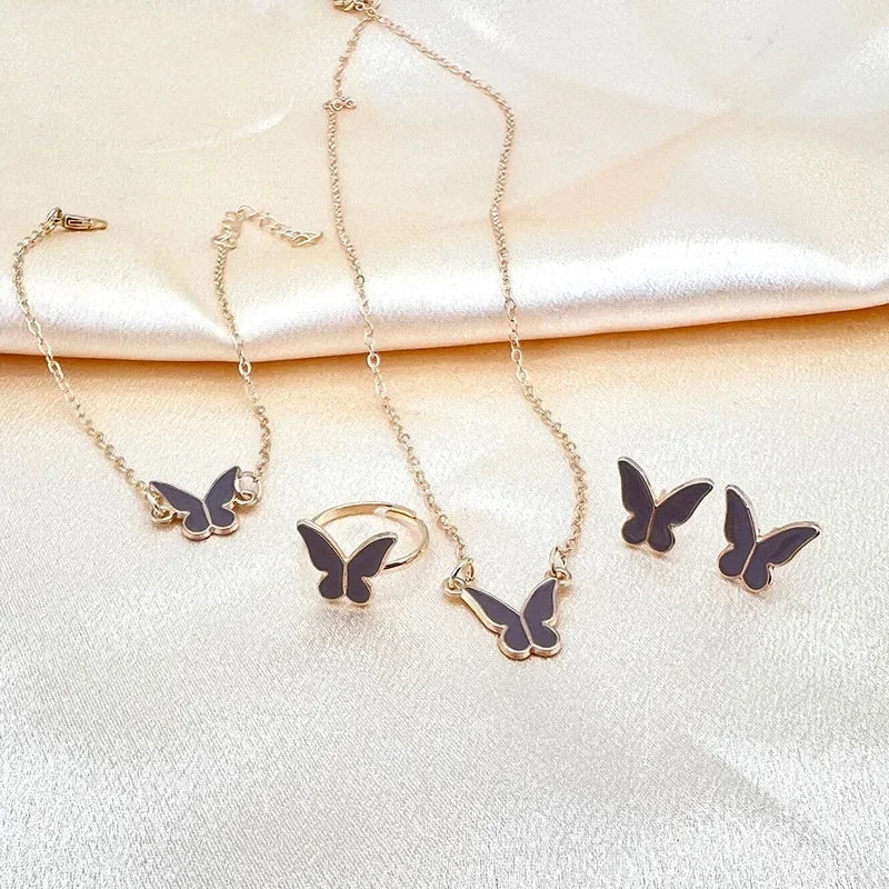 Conjunto de 4 peças de joias requintadas com pingente de borboleta esmaltado feminino